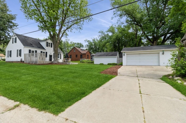 6420 Center St, Des Moines, IA 50312 - view of green lawn with concrete driveway