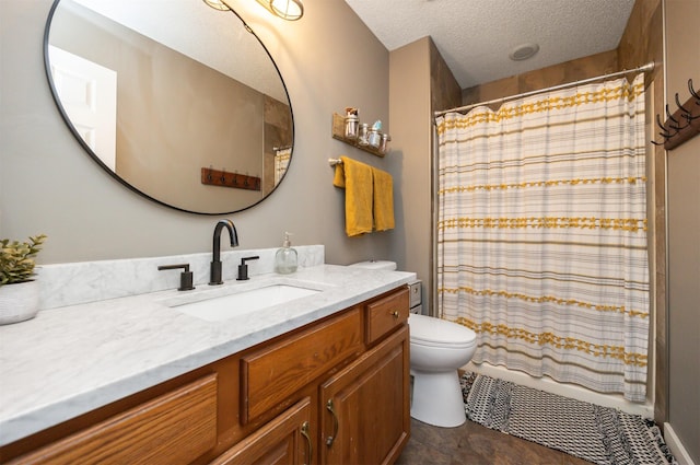 905 SE Meadowlark Dr, Grimes, IA 50111 - bathroom with vanity and a textured ceiling