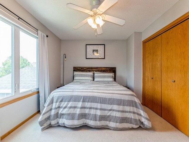 2015 NW 158th St, Clive, IA 50325 - bedroom featuring carpet floors, a closet, and multiple windows