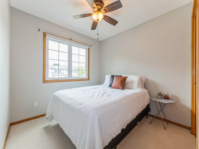 2015 NW 158th St, Clive, IA 50325 - bedroom with light colored carpet and ceiling fan