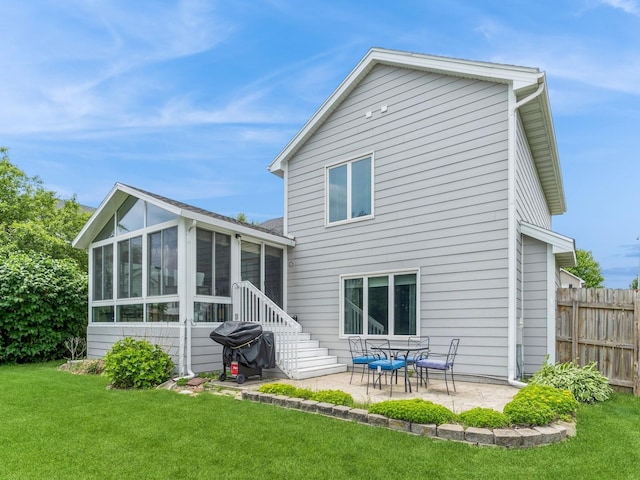 2015 NW 158th St, Clive, IA 50325 - back of house featuring a sunroom and a patio area