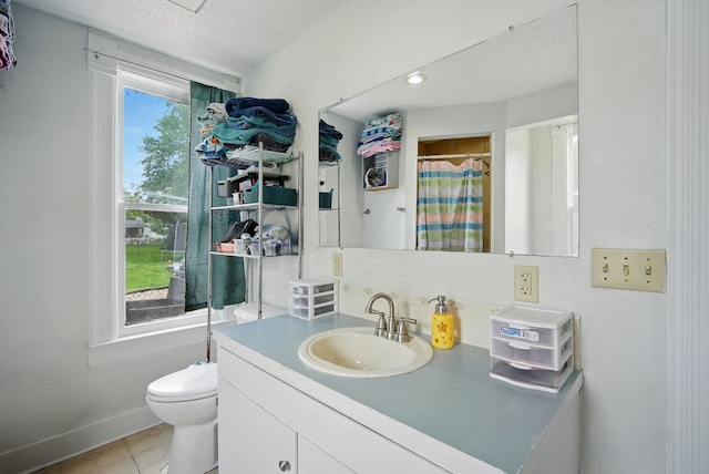 455 NW 2nd St, Earlham, IA 50072 - bathroom with vanity, a textured ceiling, a shower with curtain, and tile patterned flooring