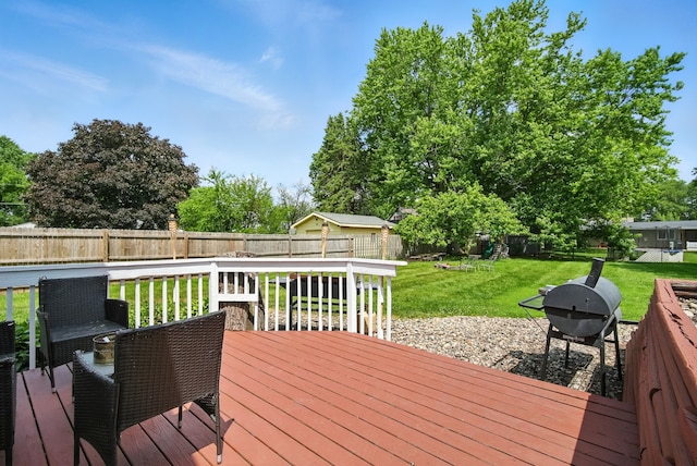 455 NW 2nd St, Earlham, IA 50072 - wooden terrace featuring a fenced backyard and grilling area