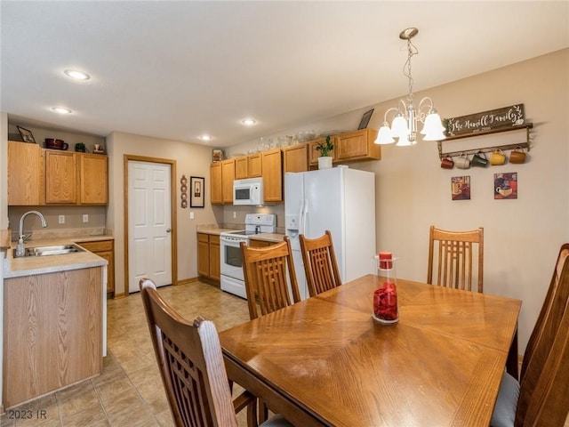 2005 E 1st Ave, Indianola, IA 50125 - dining area with a chandelier and recessed lighting