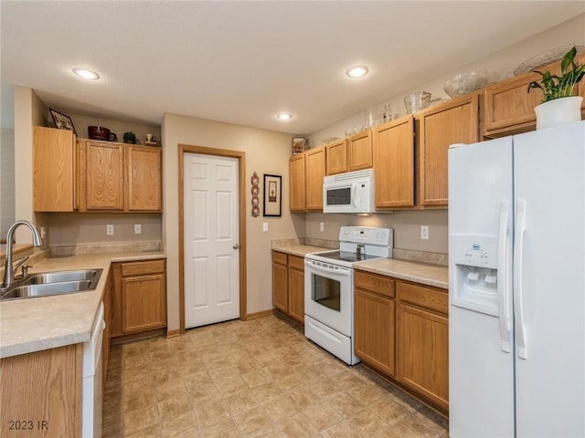 2005 E 1st Ave, Indianola, IA 50125 - kitchen with white appliances, light countertops, and recessed lighting