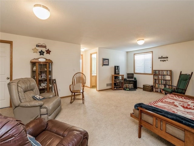 2005 E 1st Ave, Indianola, IA 50125 - carpeted bedroom with connected bathroom
