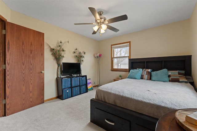 102 Kellogg Ave, Dallas Center, IA 50063 - bedroom with carpet and a ceiling fan