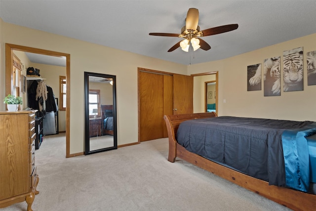 102 Kellogg Ave, Dallas Center, IA 50063 - bedroom with light colored carpet and a ceiling fan