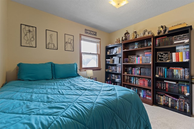 102 Kellogg Ave, Dallas Center, IA 50063 - carpeted bedroom featuring a textured ceiling
