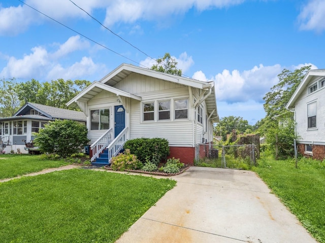 3324 Rollins Ave, Des Moines, IA 50312 - bungalow featuring a gate and concrete driveway