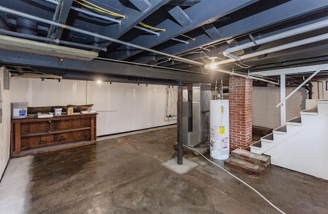 16 E Leach Ave, Des Moines, IA 50315 - unfinished below grade area featuring water heater, stairway, and heating unit