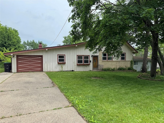 2601 Sherwood Dr, Des Moines, IA 50310 - ranch-style house with a front yard, a chimney, driveway, an attached garage, and board and batten siding