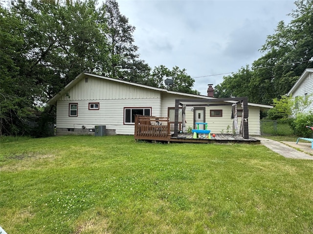 2601 Sherwood Dr, Des Moines, IA 50310 - rear view of house with a deck and a chimney