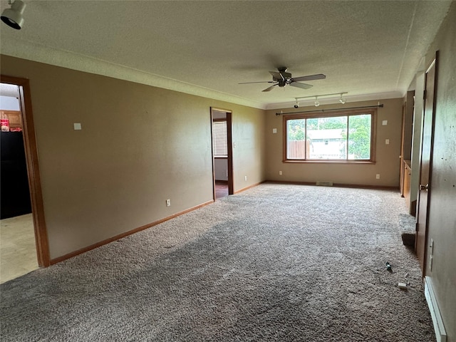 2601 Sherwood Dr, Des Moines, IA 50310 - carpeted spare room with ceiling fan, a textured ceiling, and crown molding