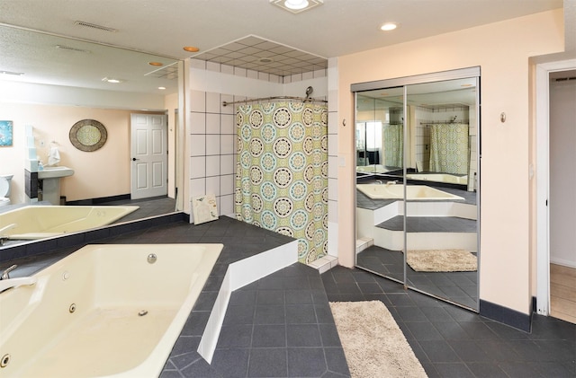 6771 College Ave, Windsor Heights, IA 50324 - bathroom featuring tile patterned floors, recessed lighting, a jetted tub, vanity, and a shower with curtain