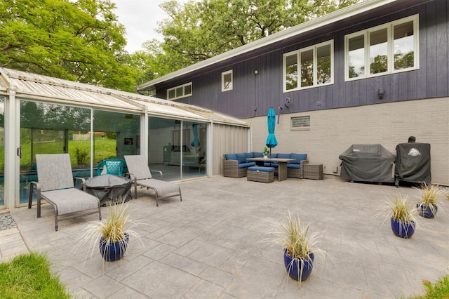 6771 College Ave, Windsor Heights, IA 50324 - view of patio / terrace with an outdoor living space and area for grilling