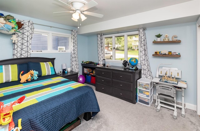 6771 College Ave, Windsor Heights, IA 50324 - bedroom with carpet floors and a ceiling fan
