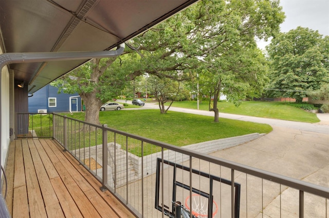 6771 College Ave, Windsor Heights, IA 50324 - wooden porch featuring a yard