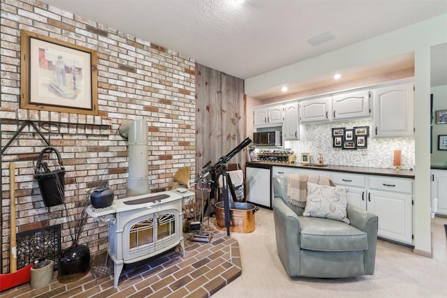 4210 Beaver Hills Dr, Des Moines, IA 50310 - living area featuring a wood stove