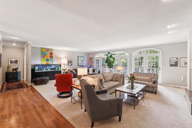 4210 Beaver Hills Dr, Des Moines, IA 50310 - living room with crown molding, a textured ceiling, and light wood-type flooring