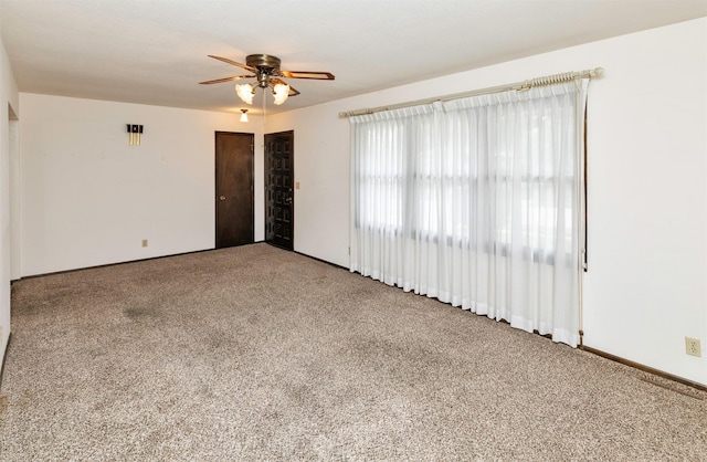 460 N 9th St, Carlisle, IA 50047 - unfurnished room with carpet floors and a ceiling fan
