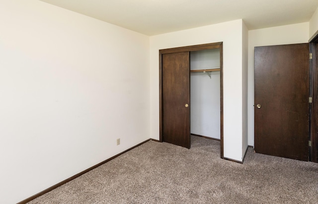 460 N 9th St, Carlisle, IA 50047 - unfurnished bedroom with carpet and a closet