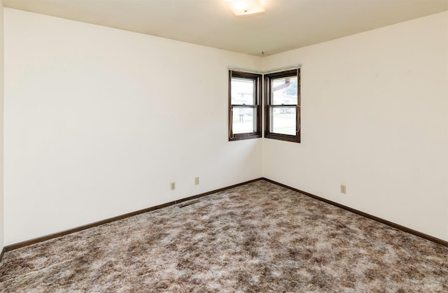460 N 9th St, Carlisle, IA 50047 - empty room with baseboards and carpet floors
