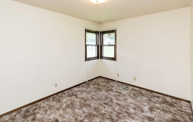 460 N 9th St, Carlisle, IA 50047 - empty room featuring carpet and baseboards
