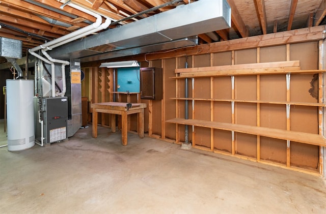 460 N 9th St, Carlisle, IA 50047 - unfinished basement featuring gas water heater and heating unit