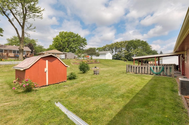460 N 9th St, Carlisle, IA 50047 - view of green lawn with a storage shed
