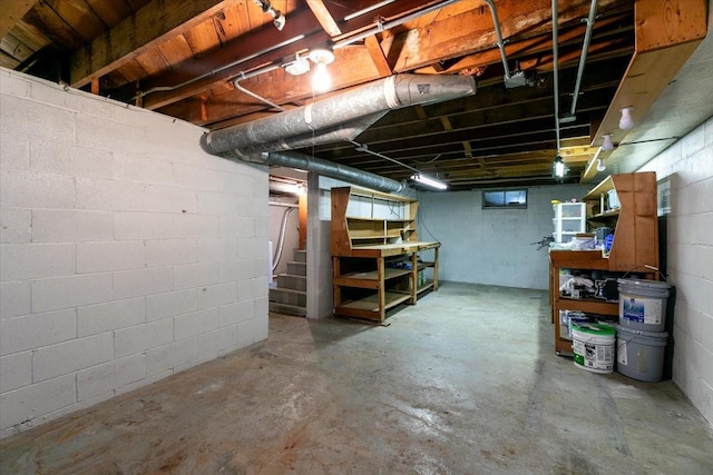 2325 61st St, Des Moines, IA 50322 - unfinished below grade area with concrete block wall and stairs
