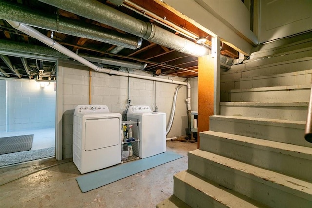 2325 61st St, Des Moines, IA 50322 - unfinished basement with stairs and washing machine and clothes dryer