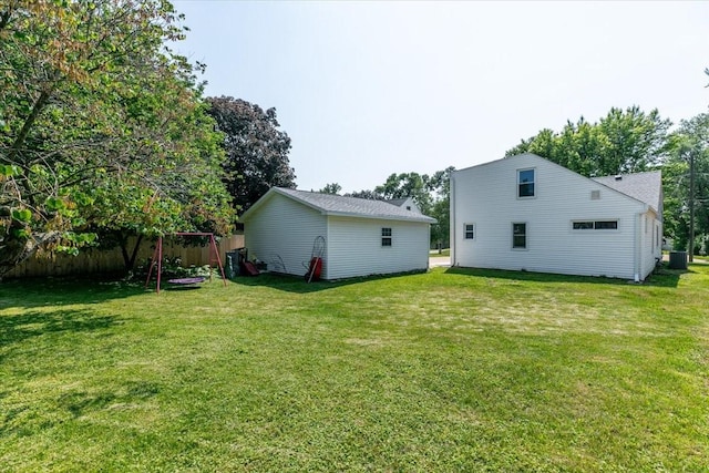 2325 61st St, Des Moines, IA 50322 - rear view of property with a lawn