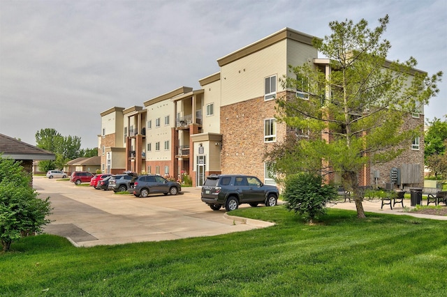 6350 Coachlight Dr Unit 1308, West Des Moines, IA 50266 - view of property with uncovered parking