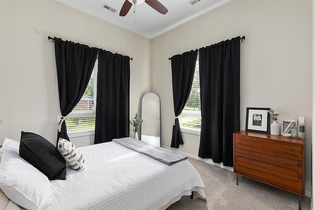 6350 Coachlight Dr Unit 1308, West Des Moines, IA 50266 - carpeted bedroom with ceiling fan and baseboards
