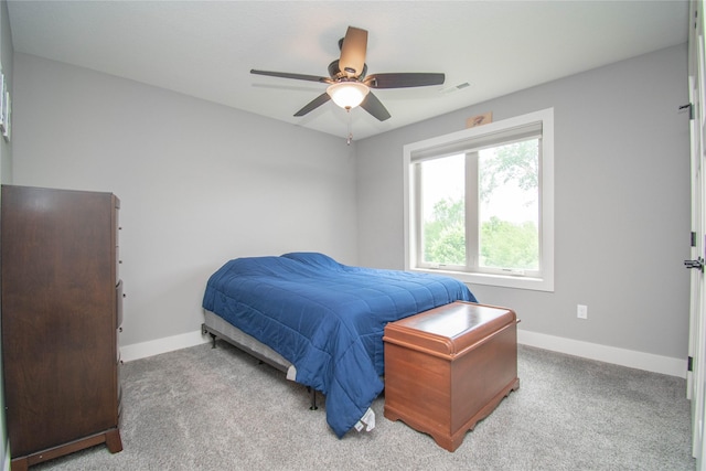 2416 NW Springbrooke Dr, Grimes, IA 50111 - carpeted bedroom with baseboards and a ceiling fan
