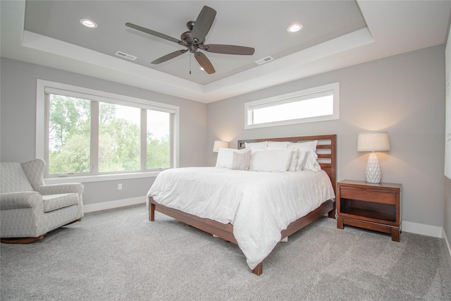 2416 NW Springbrooke Dr, Grimes, IA 50111 - carpeted bedroom featuring a raised ceiling, recessed lighting, and a ceiling fan
