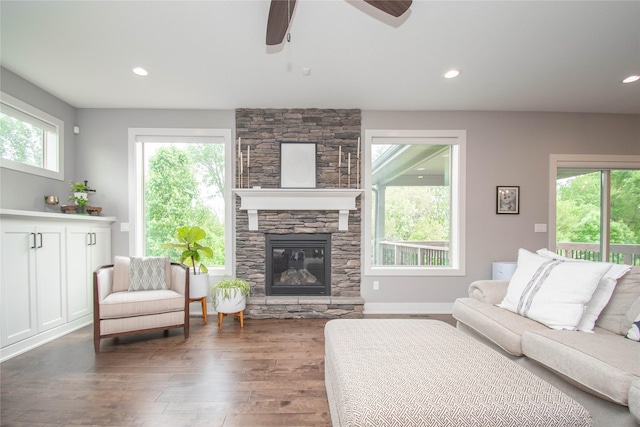 2416 NW Springbrooke Dr, Grimes, IA 50111 - living area featuring wood-type flooring, a ceiling fan, recessed lighting, and a fireplace