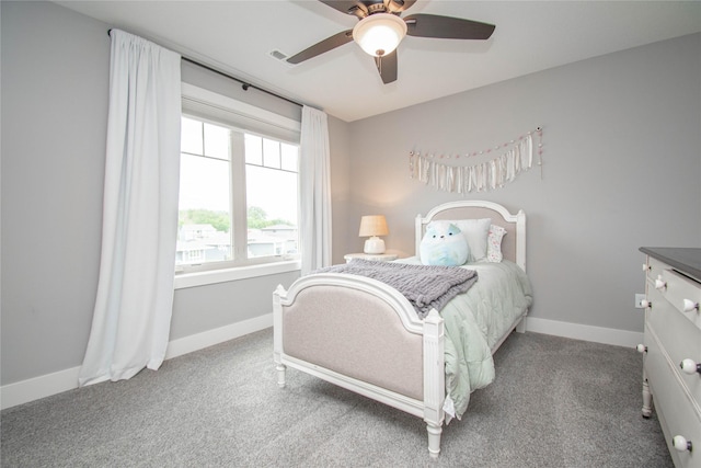 2416 NW Springbrooke Dr, Grimes, IA 50111 - carpeted bedroom with baseboards and ceiling fan