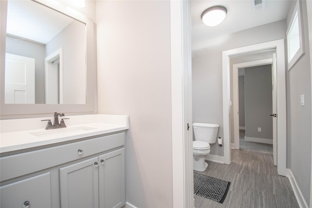 2416 NW Springbrooke Dr, Grimes, IA 50111 - bathroom with vanity and wood finished floors