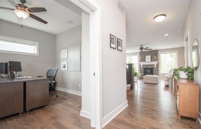 2416 NW Springbrooke Dr, Grimes, IA 50111 - office with a ceiling fan, healthy amount of natural light, wood finished floors, and recessed lighting