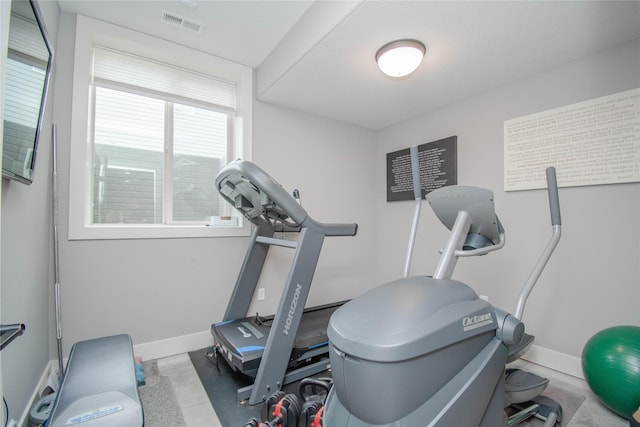 2416 NW Springbrooke Dr, Grimes, IA 50111 - workout room featuring baseboards