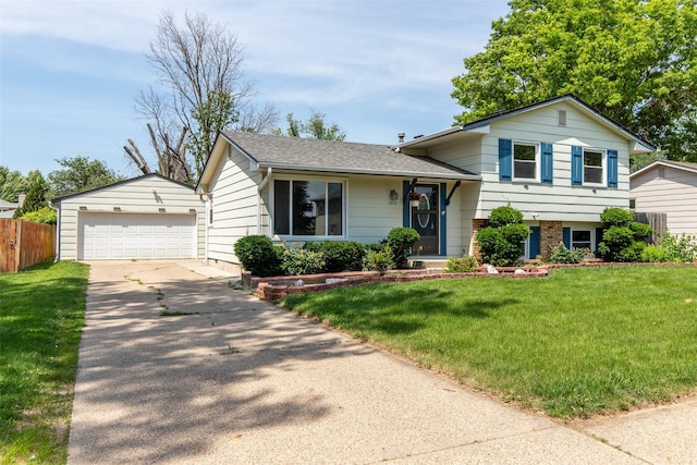 7013 Twana Dr, Urbandale, IA 50322 - split level home featuring driveway and roof with shingles