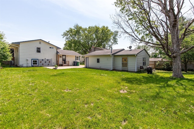 7013 Twana Dr, Urbandale, IA 50322 - back of house with a patio