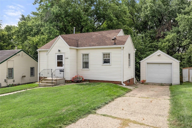 2326 Adams Ave, Des Moines, IA 50310 - view of front of home with an outdoor structure, roof with shingles, driveway, a garage, and a front yard