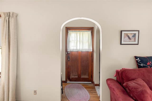 2326 Adams Ave, Des Moines, IA 50310 - foyer entrance featuring arched walkways and light wood-style floors