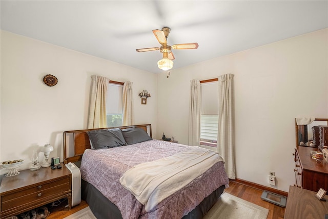 2326 Adams Ave, Des Moines, IA 50310 - bedroom with light wood-style flooring and a ceiling fan