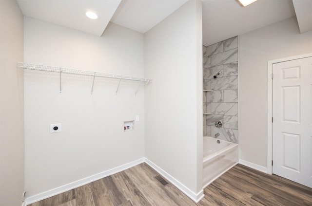 1332 E Sheridan Ave, Des Moines, IA 50316 - laundry area with hookup for a washing machine, hookup for an electric dryer, wood finished floors, and recessed lighting