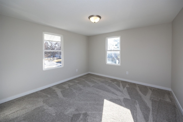 1332 E Sheridan Ave, Des Moines, IA 50316 - unfurnished room with plenty of natural light and carpet floors