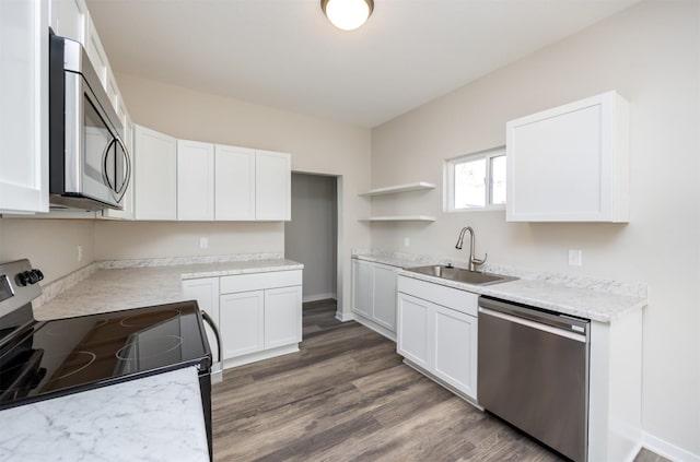 1332 E Sheridan Ave, Des Moines, IA 50316 - kitchen featuring stainless steel appliances, open shelves, white cabinets, and dark wood-type flooring